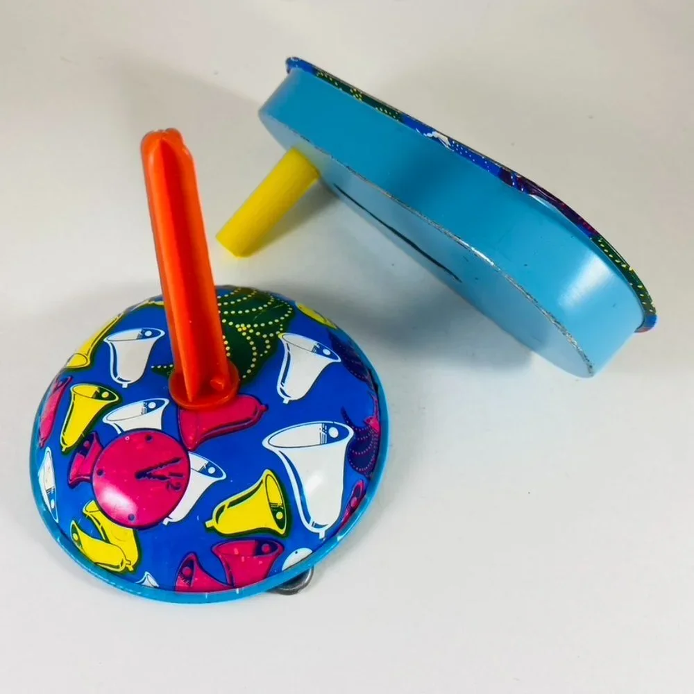 Two vintage tin New Years Eve royal blue cocktail New Years print noise makers.